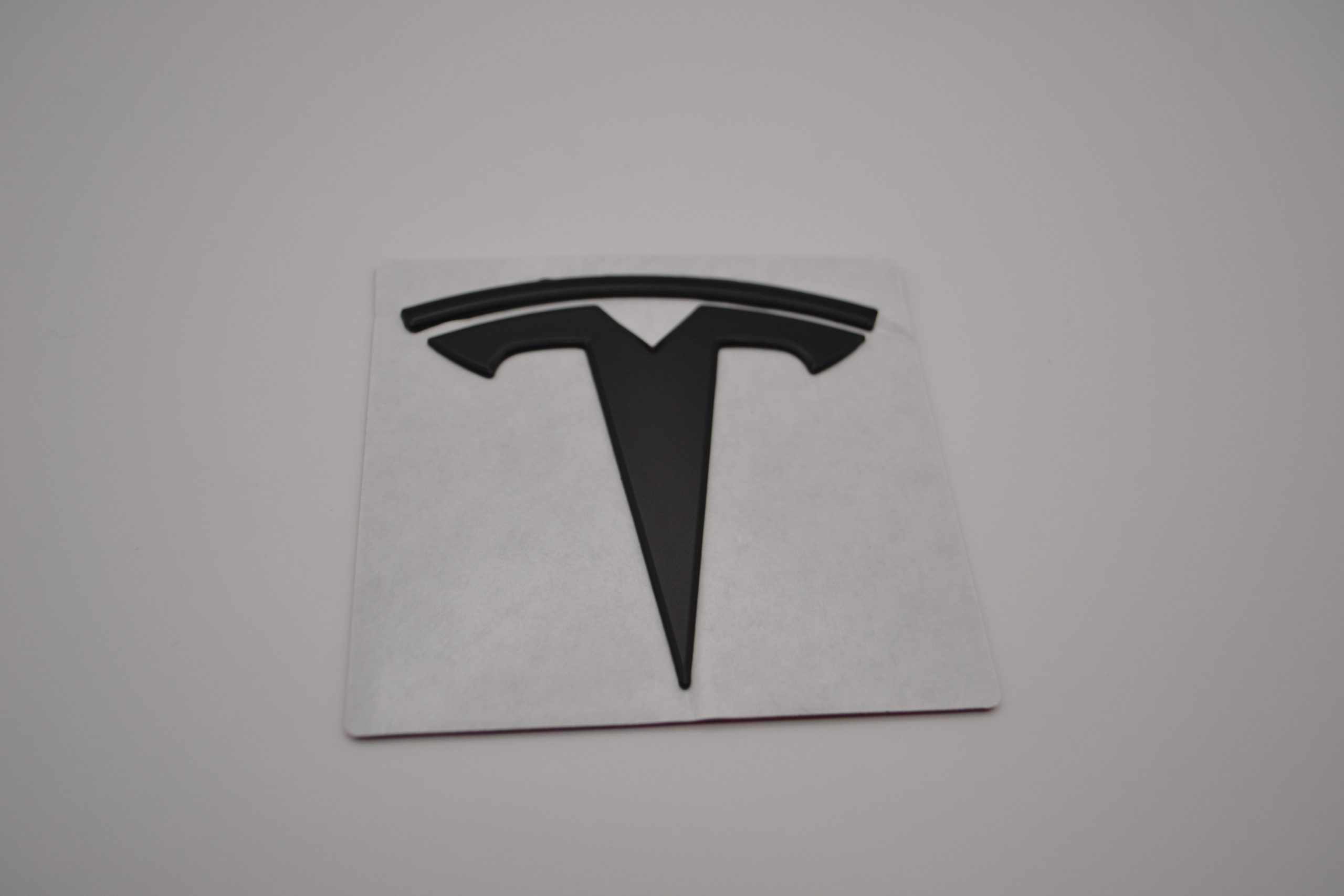 Emblem Tesla Front/Rear Black Metal